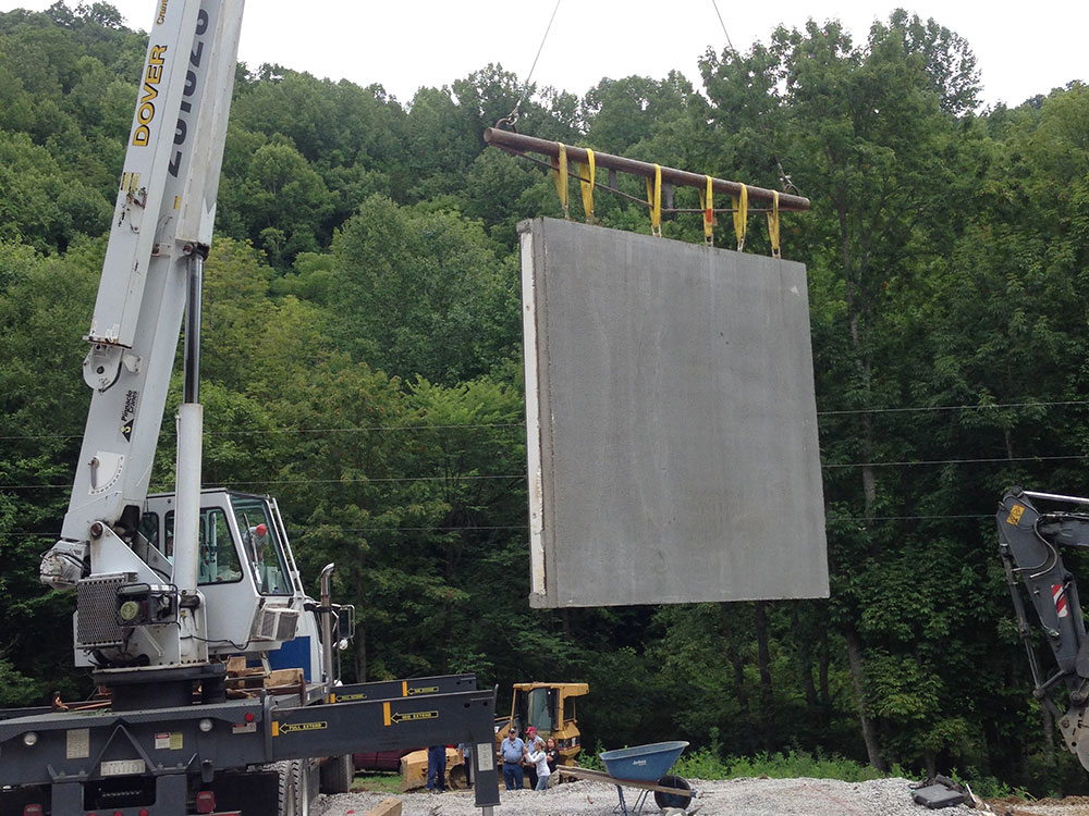 Precast wall being set into place