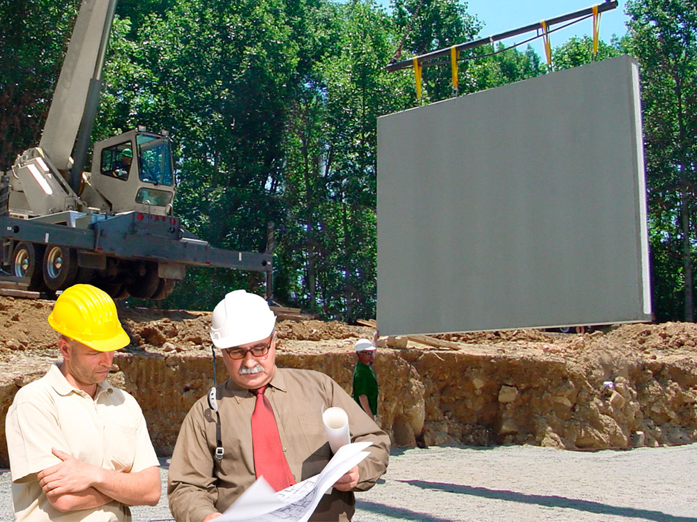 precast wall being dropped into place